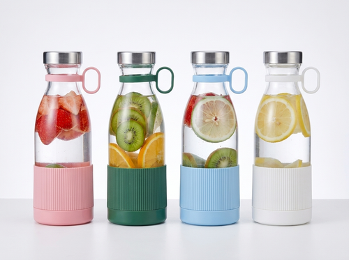 Portable juice blender in four colors: pink, green, blue, white